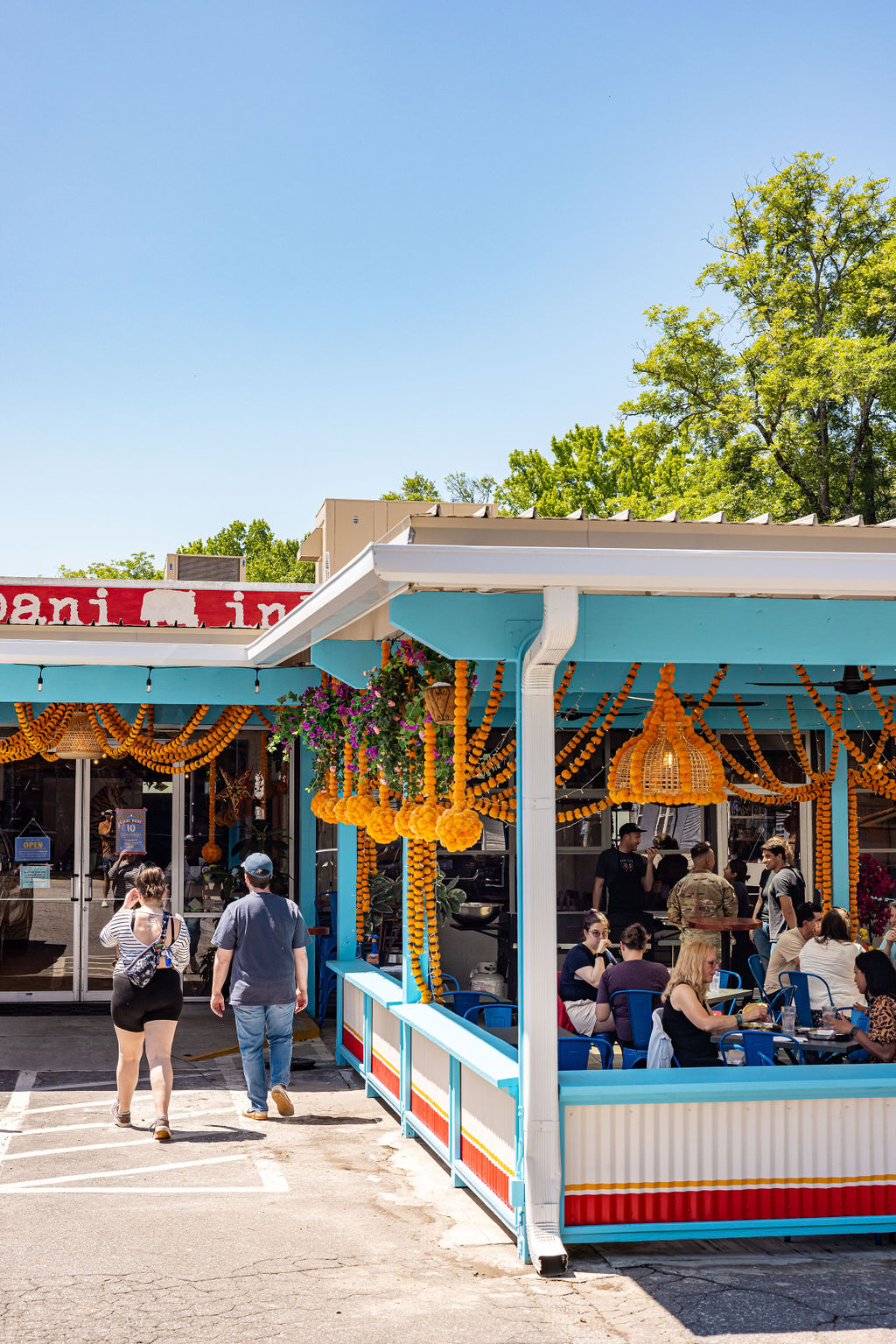Colorful restaurant exterior with patio space