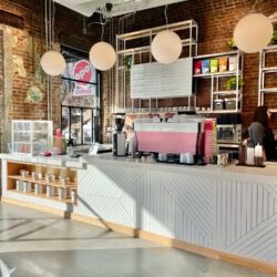 Opo Coffee interior with pink espresso machine