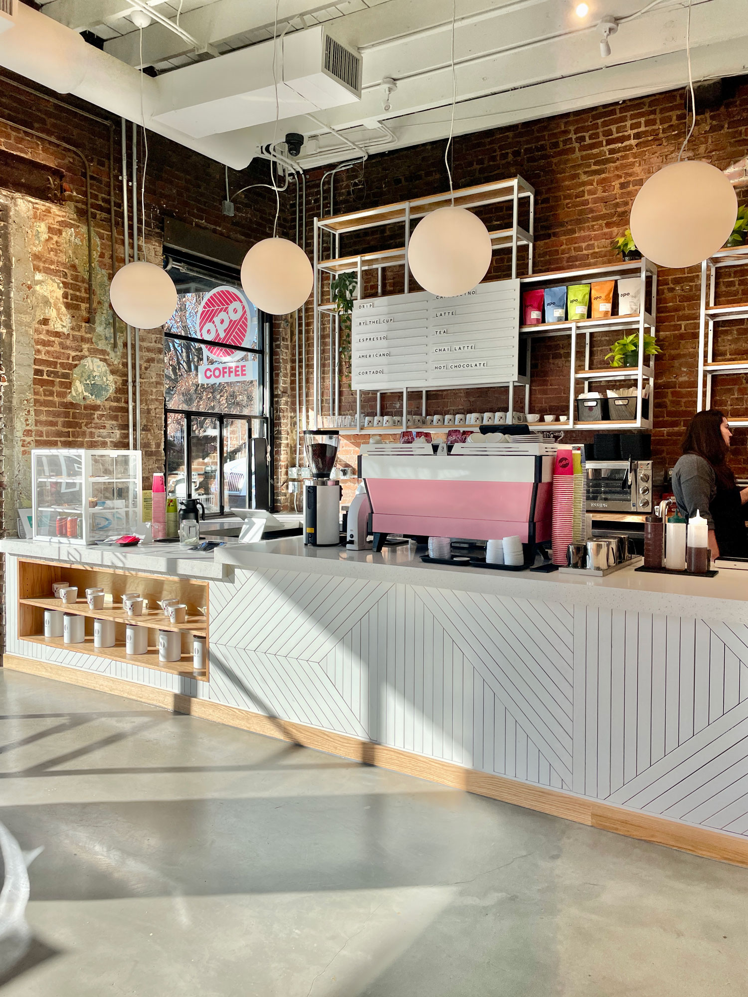 Opo Coffee interior with pink espresso machine