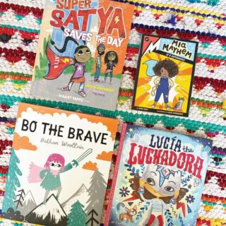 four children books with Black, Hispanic, and white children protagonists on the covers