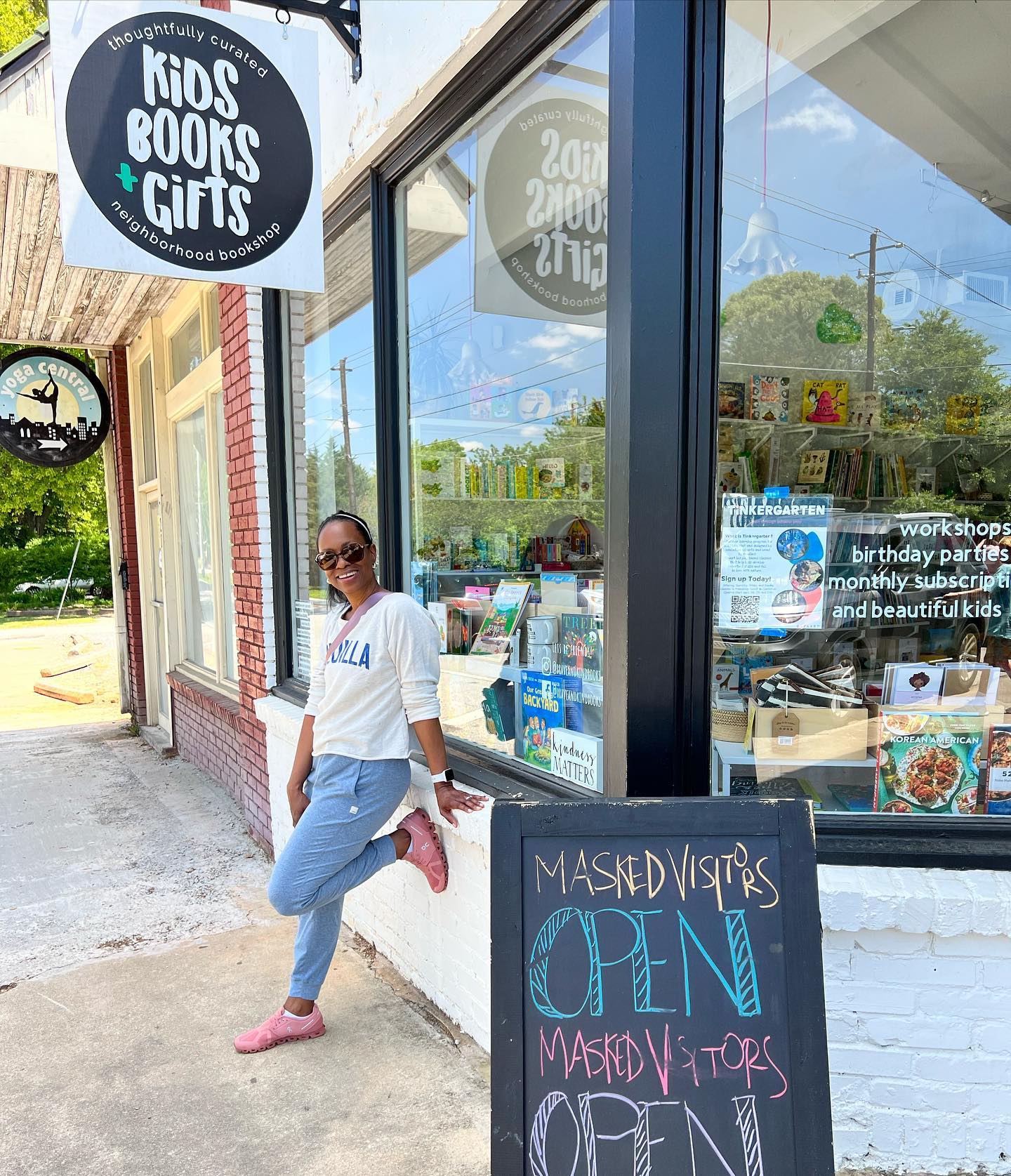 Owner Bunnie Hilliard outside Brave + Kind Bookshop