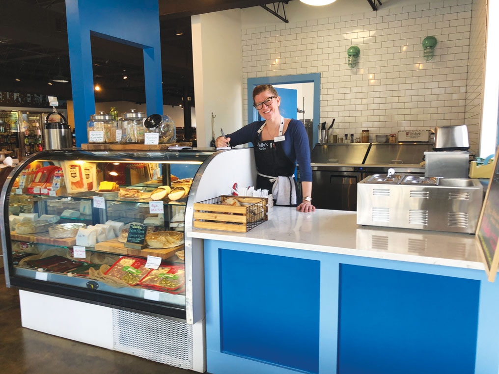 woman at the deli counter at Kelly's Market