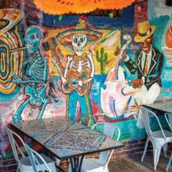 Colorful Mural Of Skeleton Band At Mezcalito's