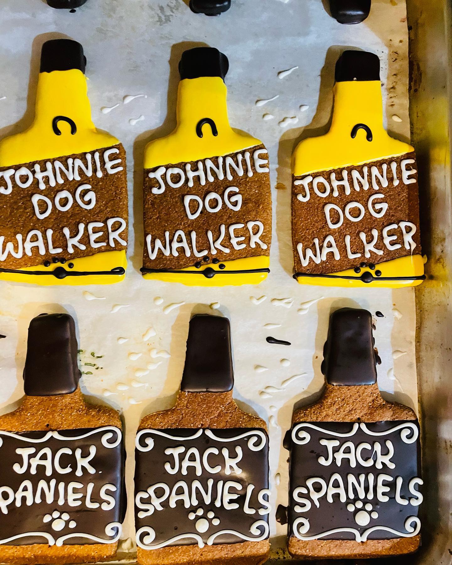 Taj Ma Hound's "Johnnie Dog Walker" and "Jack Spaniels" decorated puppy treat